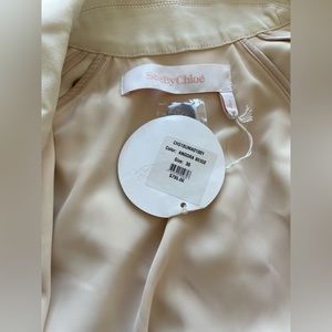 With tag. Limited collection for runway seasons.